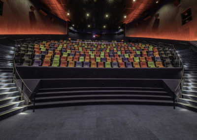 Empty theater seats inside the Rango's Giant Cinema