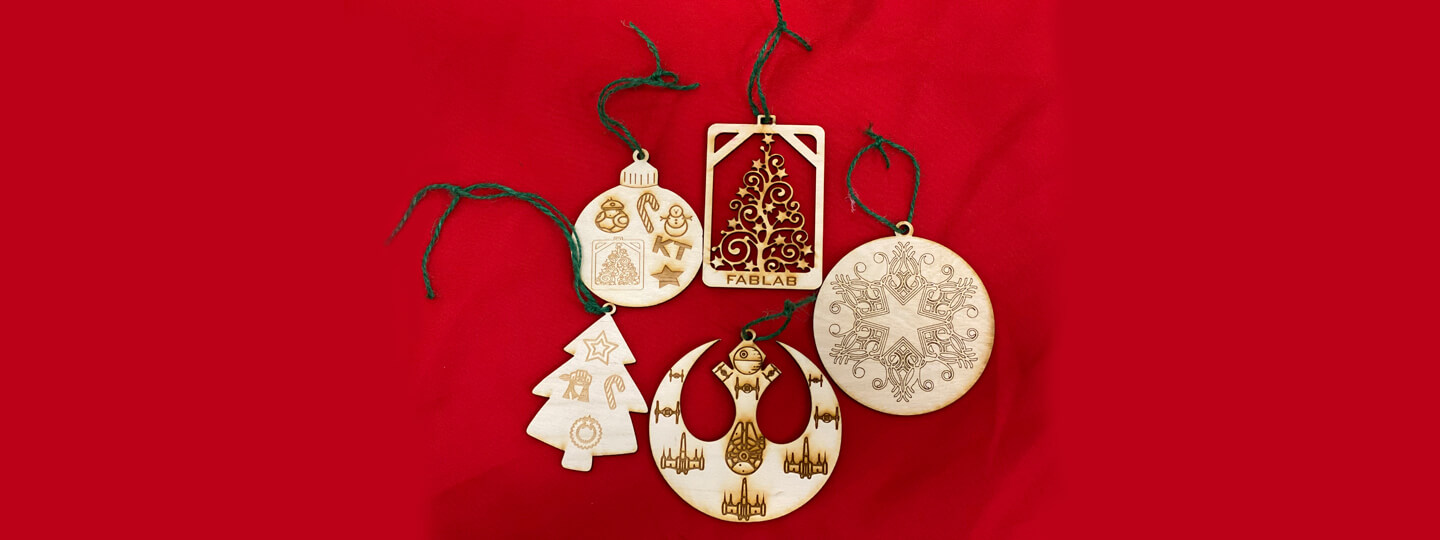 Five wooden laser cut Christmas ornaments