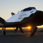 Sierra Nevada Corp’s Dream Chaser posed on ramp at sunrise at NASA Armstrong Flight Research Center in California.