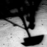 Surveyor 1 shadow against the lunar surface.