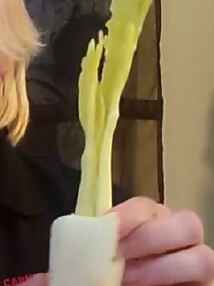 Hand holding celery