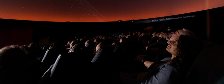 Guests sitting in Buhl Planetarium
