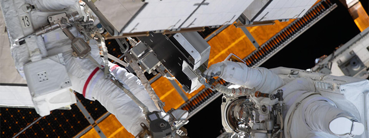Two astronauts outside of the ISS