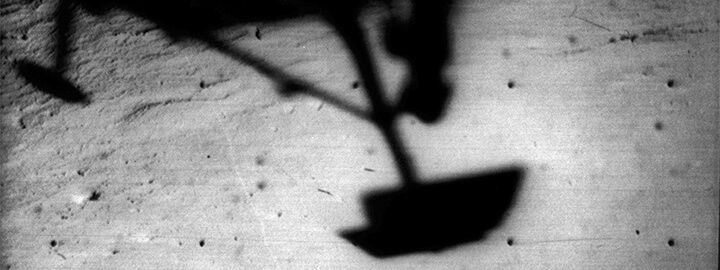 Surveyor 1 shadow against the lunar surface.