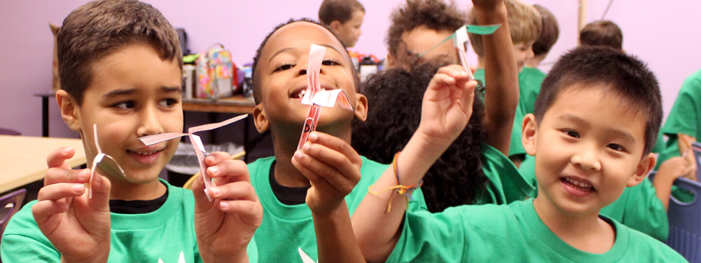 Children with paper rockets