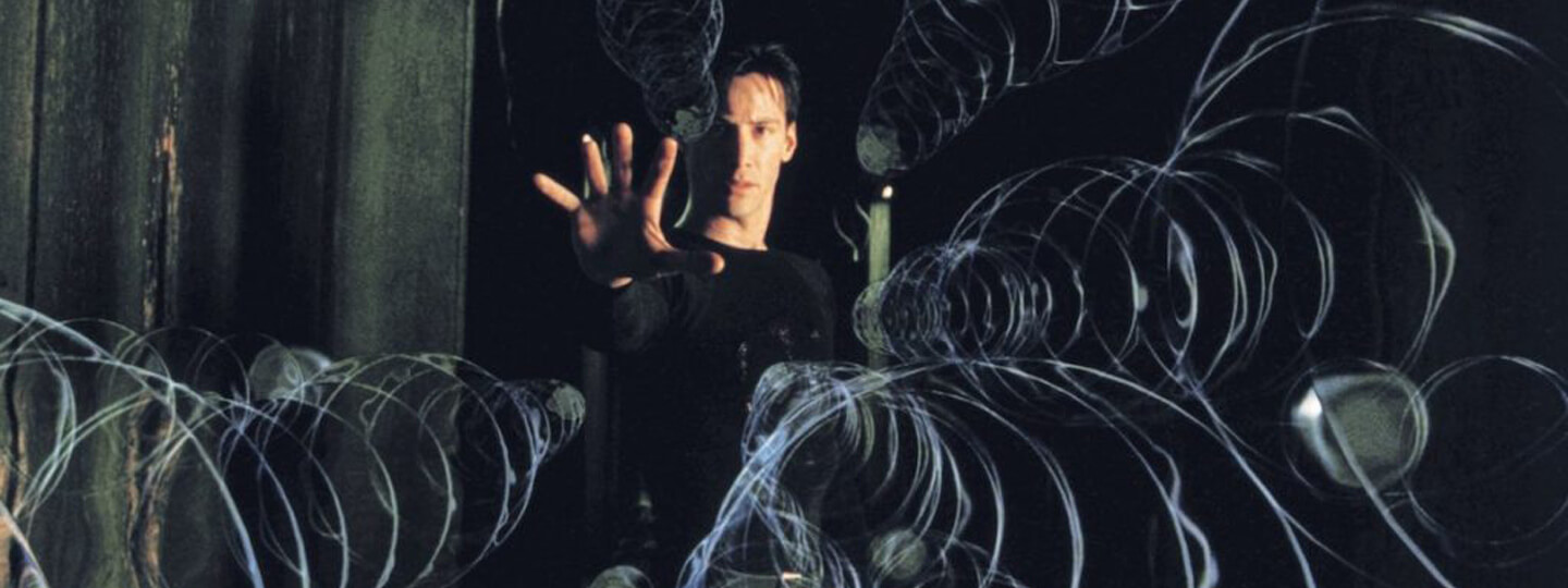 Neo from The Matrix stopping bullets